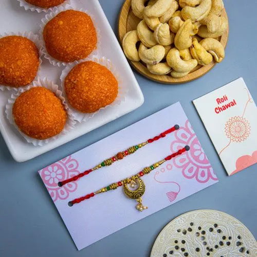 Rudraksha & Peacock Rakhi Combo with Sweets