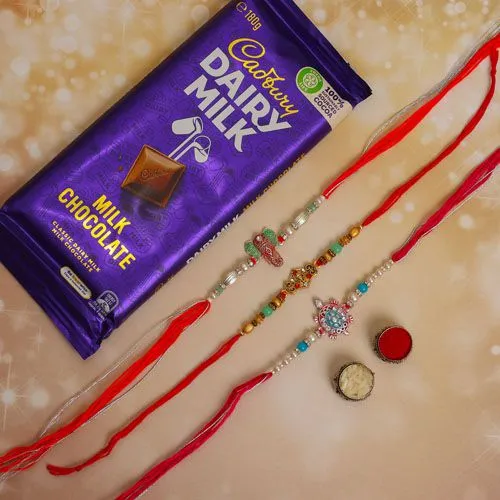 Trio of Elegant Rakhis with Dairy Milk Delight