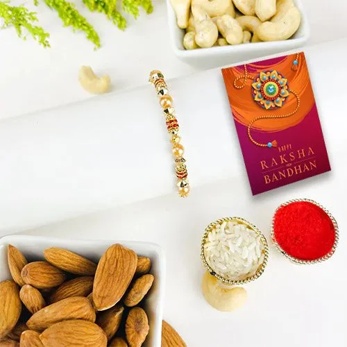 Charming Pearl Rakhi Combo with Healthy Nuts