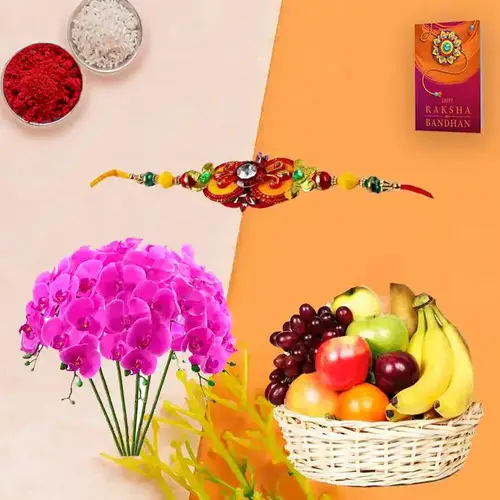 Tropical Fresh Fruits Basket decorated with Orchids with 1 Family Set Rakhi and Roli Tilak Chawal