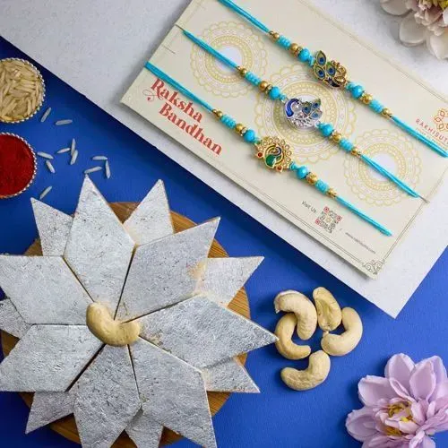 Gorgeous Peacock Rakhi Set N Kaju Katli Combo